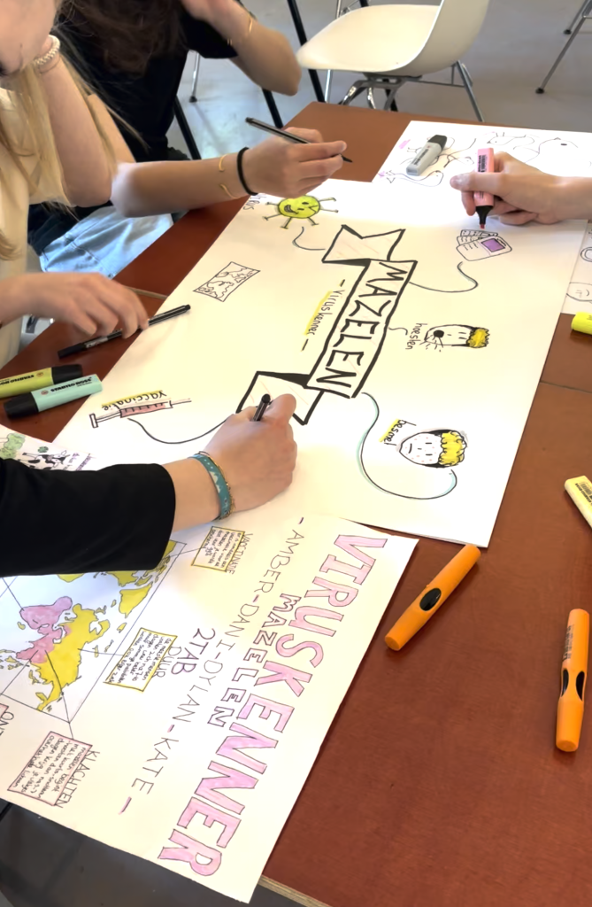 Leerlingen maken visuele pitch tijdens teken workshop Viruskener 2026